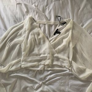 White crop top from Forever21 with flowing sleeves